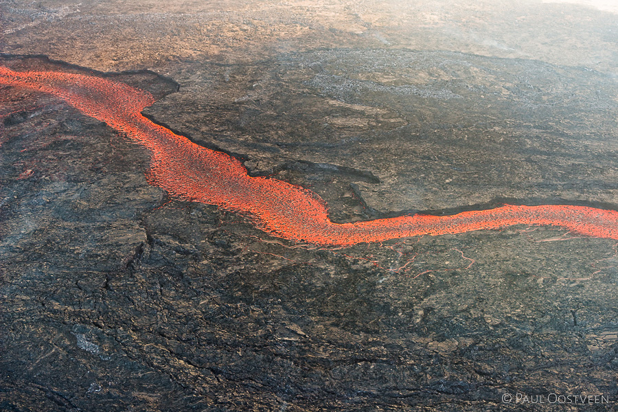 Stream of lava flowing from Bardárbunga flowing away at lava field Holuhraun in Iceland in 2014.